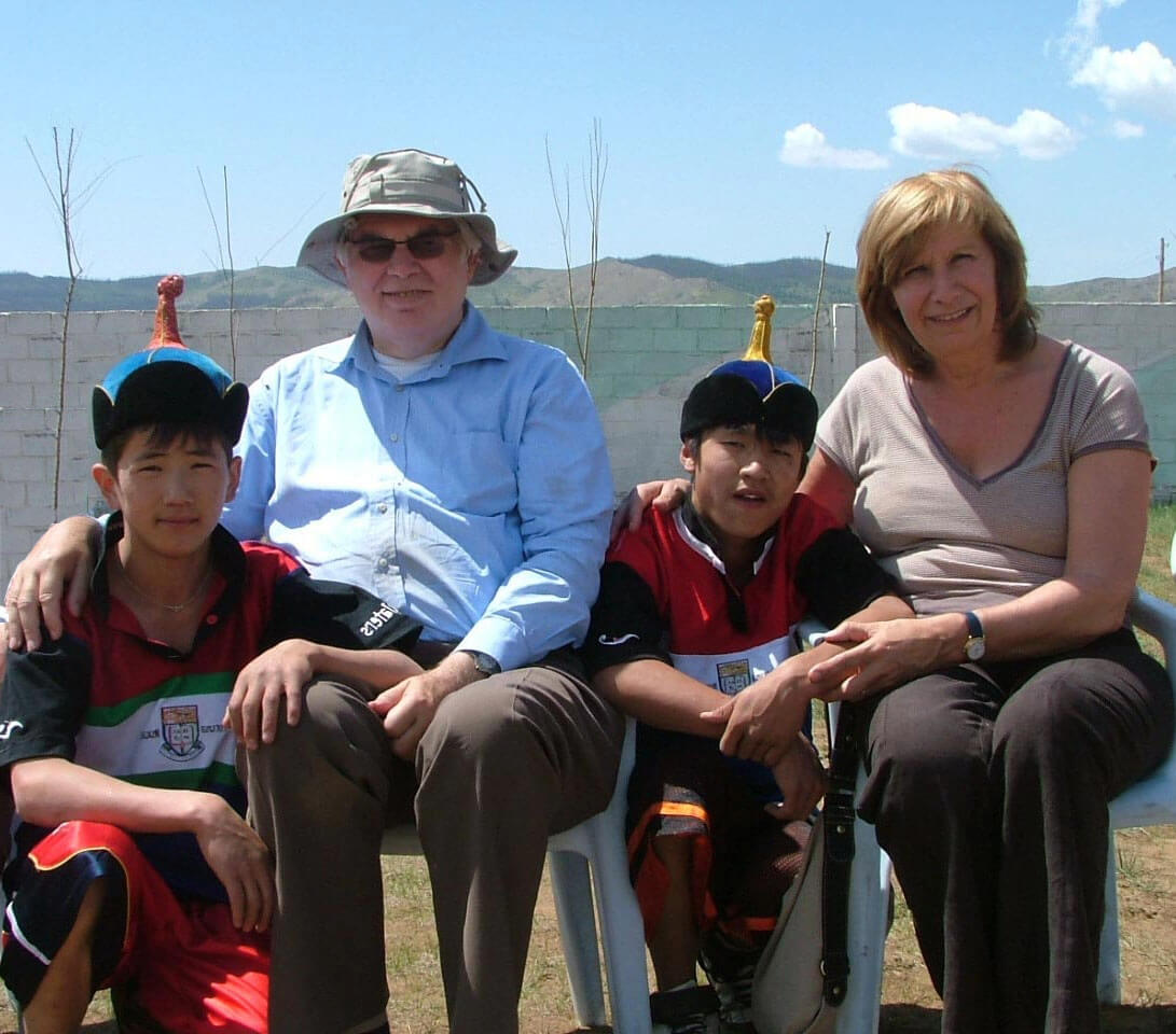 Mrs. Griet Talpe and Mr. Etienne Kaesteker with boys of orphanage center